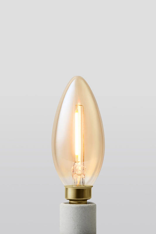 Modern candelabra LED light bulb with warm vintage Edison style glow