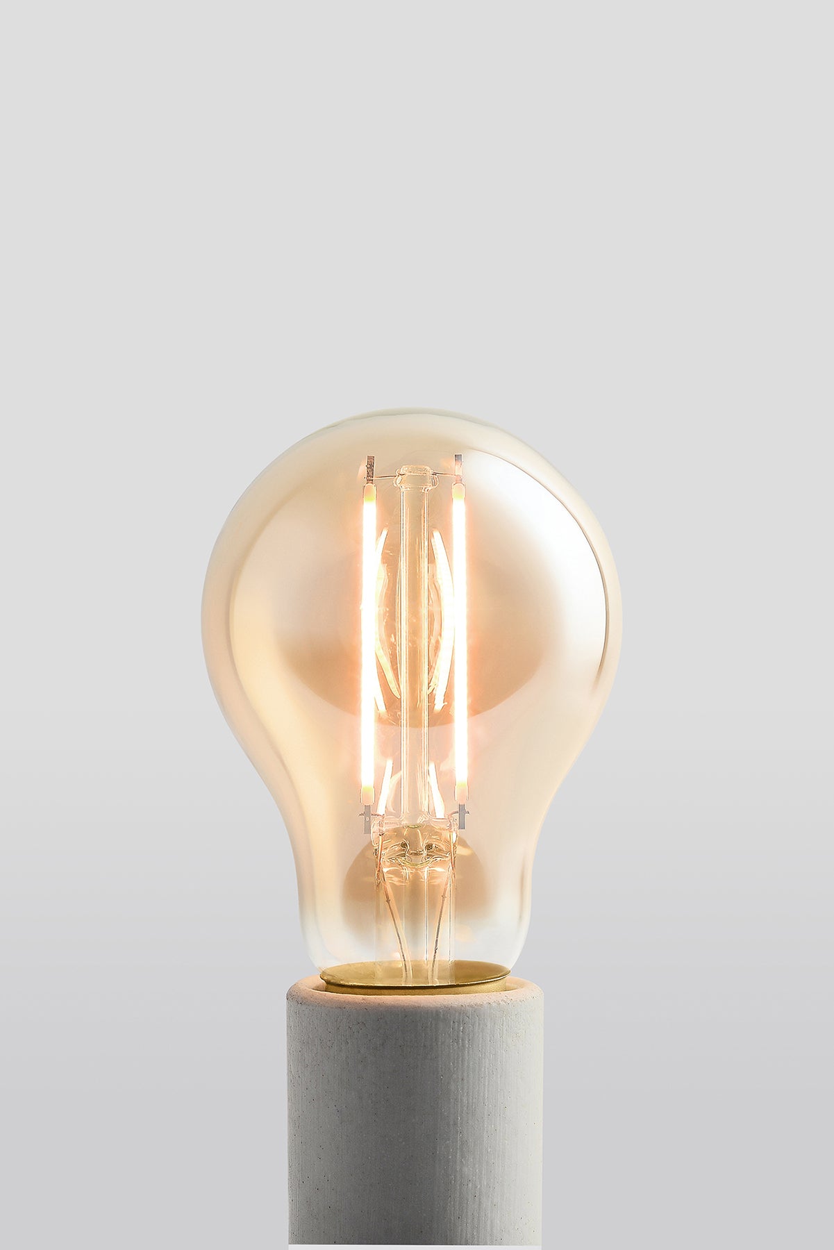 Modern A19 LED light bulb with warm vintage Edison style glow