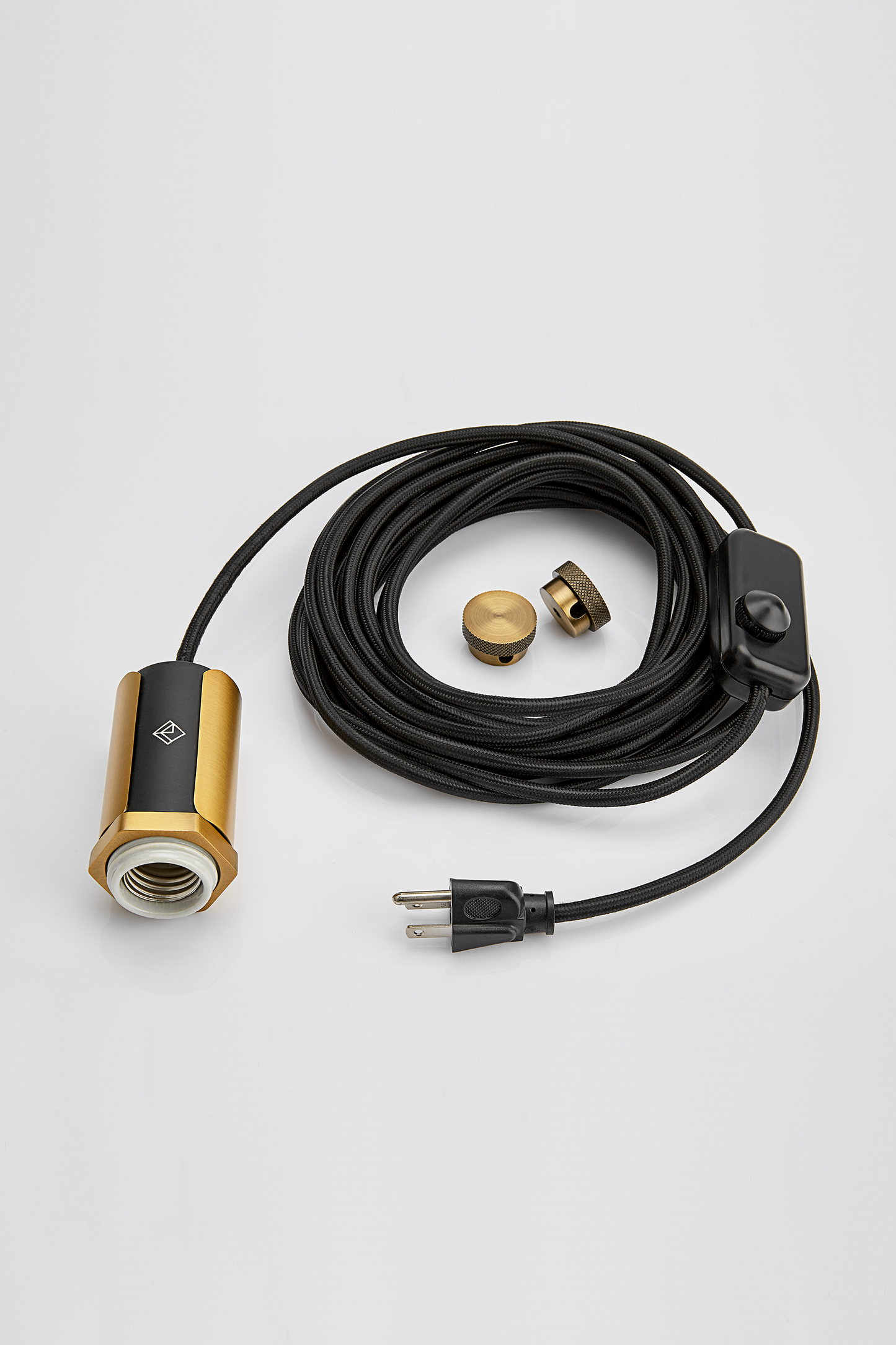 The Alamere Plug-In Pendant is the ideal swag kit lamp for any space. Easy to install, it plugs into any standard wall outlet and comes with two cord anchors to hang it anywhere. An inline dimmer on the cord allows for adjustability with any compatible dimming light bulb.