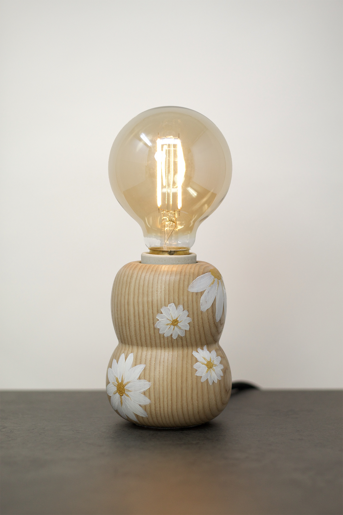Kabuto Accent Lamp – limited edition artist series with hand-painted white daisy flowers on ash wood base, one-of-a-kind Japanese-inspired table lamp