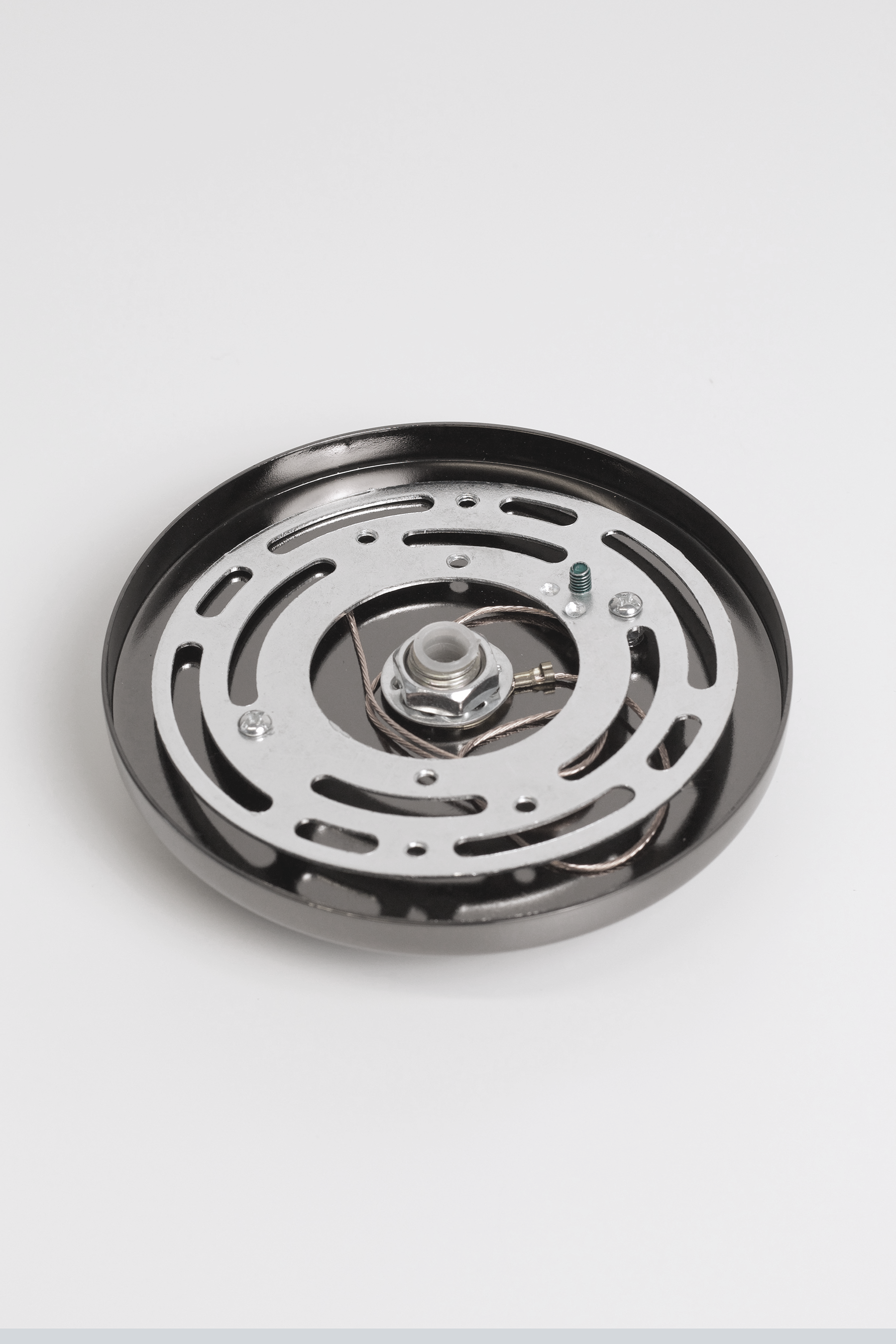 Black chrome round low-profile ceiling canopy with strain relief for pendant lights