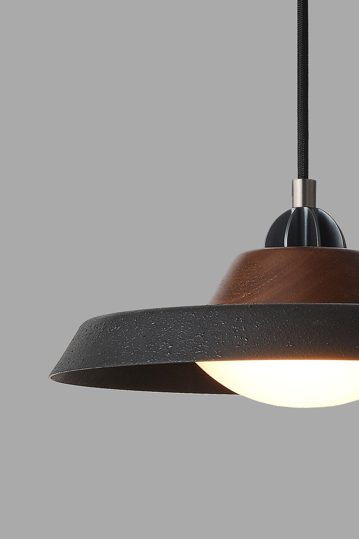 Modern industrial pendant with warm LED bulb