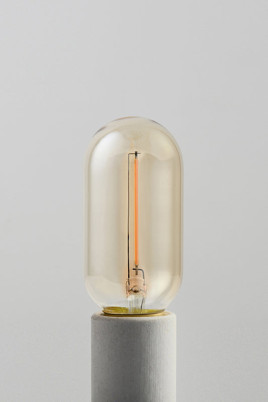 Modern T14 LED light bulb with warm vintage Edison style glow