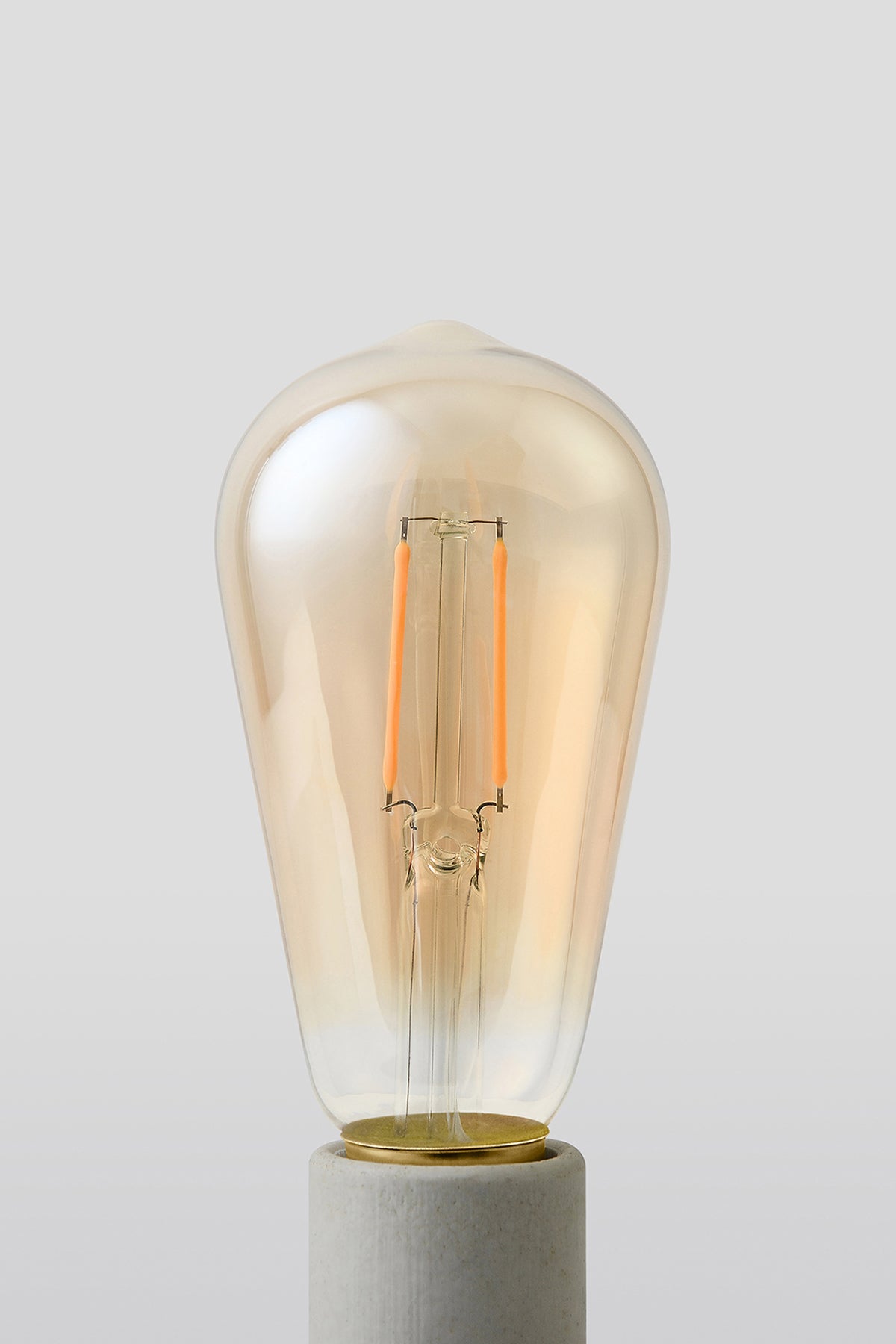 Modern ST19 LED light bulb with warm vintage Edison style glow